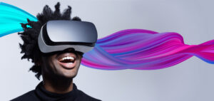 Grey background with purple wave icon on top and man with a VR headset on the left