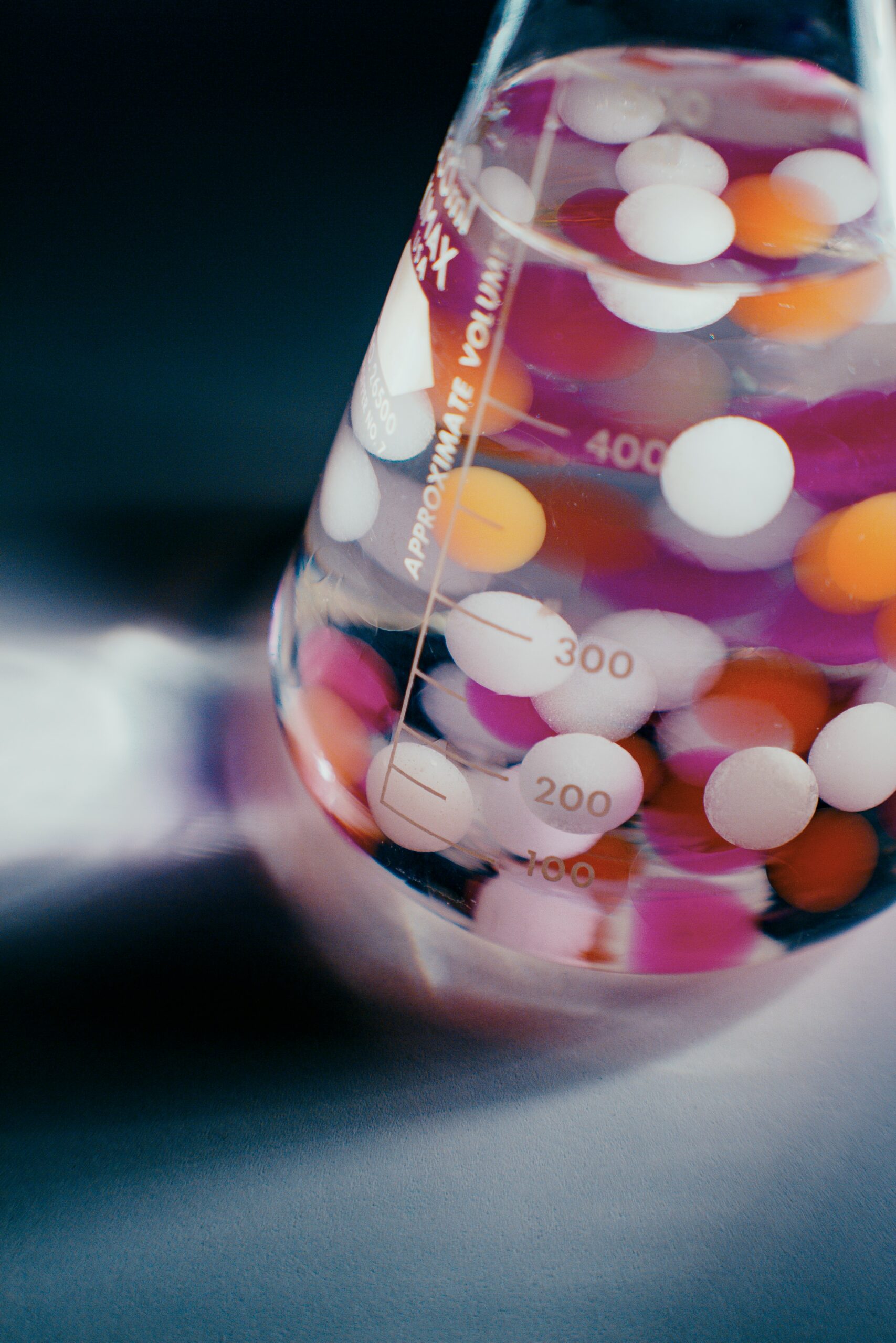 Test tube with coloured balls inside